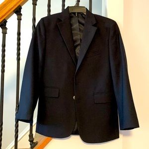 Boys size 10 blazer, worn briefly. No holes or stains.
